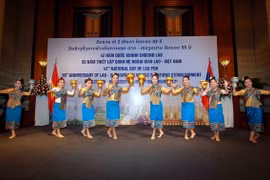 Lễ kỷ niệm 42 năm ngày Quốc khánh Lào. (Ảnh: An Đăng/TTXVN)