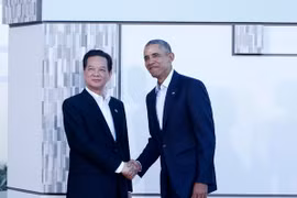 Tổng thống Hoa Kỳ Obama đón Thủ tướng Nguyễn Tấn Dũng. (Ảnh: Thống Nhất​/TTXVN)