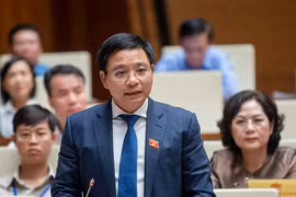 Bộ trưởng Bộ Giao thông Vận tải Nguyễn Văn Thắng giải trình. (Ảnh: CTV/Vietnam+)