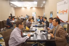 Các doanh nghiệp lữ hành Mỹ tìm hiểu về các sản phẩm du lịch của Việt Nam. (Ảnh: Đặng Huyền/TTXVN)