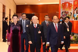 Tổng Bí thư, Chủ tịch nước Nguyễn Phú Trọng cùng Ủy viên Bộ Chính trị, Thủ tướng Chính phủ Nguyễn Xuân Phúc, Ủy viên Bộ Chính trị, Chủ tịch Quốc hội Nguyễn Thị Kim Ngân đến dự phiên họp trù bị Đại hội XIII của Đảng. (Nguồn: TTXVN)