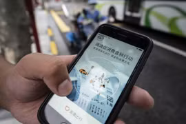 Ứng dụng đặt xe của Didi Global Inc trên điện thoại tại Trung Quốc. (Nguồn: Bloomberg) 