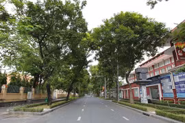 Tuyến đường Trương Định, Quận 3, Thành phố Hồ Chí Minh vắng bóng người khi thực hiện giãn cách theo Chỉ thị 16 của Thủ tướng Chính phủ. (Ảnh: Thanh Vũ/TTXVN)