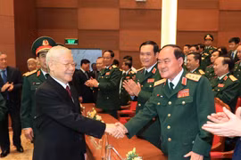 Tổng Bí thư Nguyễn Phú Trọng với các đại biểu tham dự Lễ kỷ niệm. (Ảnh: Trọng Đức/TTXVN)