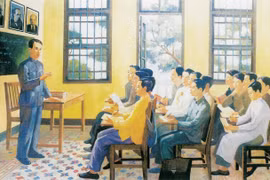 Từ 1925-1927, tại nhà số 13, đường Văn Minh (Quảng Châu, Trung Quốc), Lãnh tụ Nguyễn Ái Quốc đã mở các lớp huấn luyện chính trị, đào tạo cán bộ cho cách mạng Việt Nam. Tranh trưng bày tại triển lãm. (Ảnh: Minh Thu/Vietnam+)