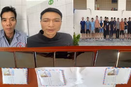 Các đối tượng đánh bạc cùng tang vật vụ án. (Ảnh: TTXVN phát)