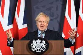 Thủ tướng Anh Boris Johnson xác nhận thỏa thuận thương mại với EU đã hoàn tất. (Ảnh: AFP/TTXVN)