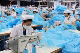 Sản xuất hàng dệt may. (Nguồn: TTXVN)