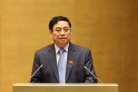 Thủ tướng Chính phủ Phạm Minh Chính trình bày Báo cáo. (Ảnh: Dương Giang/TTXVN)