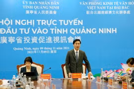 Chủ tịch UBND tỉnh Quảng Ninh Nguyễn Tường Văn phát biểu tại Hội nghị. (Ảnh: Văn Đức/TTXVN)