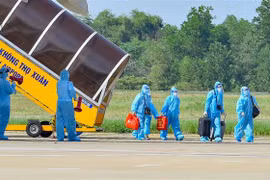 Công dân từ Thành phố Hồ Chí Minh về đến Thanh Hóa. (Ảnh: Trịnh Duy Hưng/TTXVN)