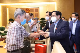 Thủ tướng Phạm Minh Chính gặp mặt, tri ân đại biểu Người có công với cách mạng. (Ảnh: Dương Giang/TTXVN)