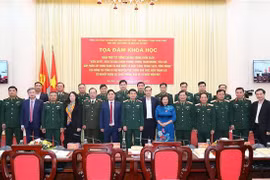 Bộ trưởng Bộ Quốc phòng Phan Văn Giang và các đại biểu dự hội thảo. (Ảnh: Trọng Đức/TTXVN)