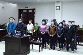 Các bị cáo tại phiên tòa phúc thẩm. (Ảnh: Phạm Kiên/TTXVN)