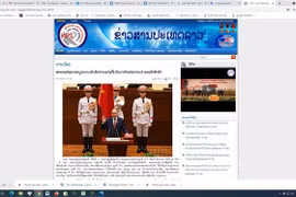 Ảnh nội dung bài viết của Thông tấn xã Đất nước Lào (KPL) đánh giá về việc Quốc hội Việt Nam bầu các chức danh chủ chốt gồm, Chủ tịch nước, Chủ tịch Quốc hội và Thủ tướng. (Ảnh: Phạm Kiên/TTXVN)