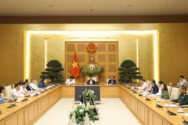 Phó Thủ tướng Vũ Ðức Ðam chủ trì cuộc họp. (Ảnh: Văn Điệp/TTXVN)