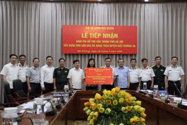Quang cảnh buổi lễ tiếp nhận. (Ảnh: Nguyễn Thắng/TTXVN)