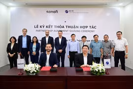 Ký kết hợp tác giữa hai bên. (Ảnh: PV/Vietnam+)