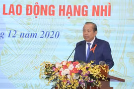 Phó Thủ tướng thường trực Chính phủ Trương Hoà Bình phát biểu tại hội nghị. 
