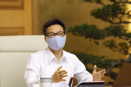 Phó Thủ tướng Vũ Đức Đam chủ trì họp Ban Chỉ đạo về công tác phòng, chống dịch. (Ảnh: Văn Điệp/TTXVN)