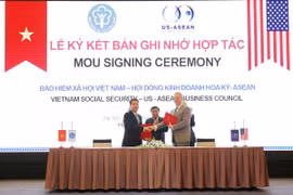 Bảo hiểm Xã hội Việt Nam và USABC ký Biên bản ghi nhớ hợp tác trong lĩnh vực thực hiện chính sách bảo hiểm y tế. (Ảnh: PV/Vietnam+)
