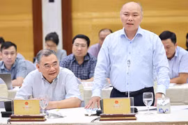 Chánh Văn phòng, Người phát ngôn Bộ Nội vụ Vũ Đăng Minh trả lời câu hỏi của các nhà báo. (Ảnh: Minh Đức/TTXVN)