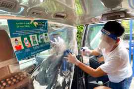 Dịch vụ GrabCar đáp ứng toàn bộ các tiêu chí an toàn đối với hoạt động giao thông vận tải trong công tác phòng, chống dịch. (Ảnh: CTV/Vietnam+)
