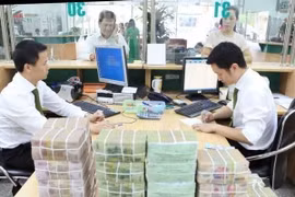 Thu ngân sách Trung ương hụt khá lớn, khoảng 28.000-29.000 tỷ đồng do ảnh hưởng của dịch COVID-19. (Nguồn ảnh: TTXVN)