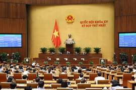95,59% tổng số đại biểu Quốc hội biểu quyết thông qua việc điều chỉnh chương trình kỳ họp thứ nhất Quốc hội khoá XV. (Ảnh: Dương Giang/TTXVN)