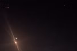 Cảnh hệ thống phòng không của Israel đánh chặn tên lửa Iran