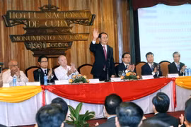 Chủ tịch nước Trần Đại Quang đến dự và phát biểu tại Diễn đàn Doanh nghiệp Việt Nam-Cuba. (Ảnh: Nhan Sáng/TTXVN) 