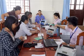 Một buổi giao dịch cho vay tại điểm giao dịch xã Thanh Nguyên, huyện Thanh Liêm, tỉnh Hà Nam. (Ảnh: Trần Việt/TTXVN)