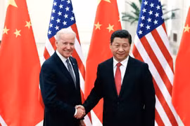 Chủ tịch Trung Quốc Tập Cận Bình và ông Joe Biden tại cuộc gặp ở Bắc Kinh, Trung Quốc tháng 12/2013. (Nguồn: Getty Images)