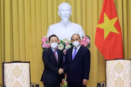 Chủ tịch nước Nguyễn Xuân Phúc tiếp ông Yoon Dae Hee, Chủ tịch Quỹ bảo lãnh tín dụng Hàn Quốc (KODIT). (Ảnh: Thống Nhất/TTXVN)