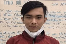 Đối tượng Nguyễn Thanh Huy tại cơ quan công an. (Ảnh: TTXVN phát)