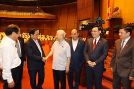 Tổng Bí thư Nguyễn Phú Trọng, Chủ tịch nước Nguyễn Xuân Phúc, Thủ tướng Chính phủ Phạm Minh Chính, Chủ tịch Quốc hội Vương Đình Huệ cùng các lãnh đạo Đảng, Nhà nước dự phiên họp. (Ảnh: Trí Dũng/TTXVN)