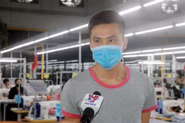 Anh Nguyễn Đức Chính - người dũng cảm cứu nữ sinh đang nguy hiểm đến tính mạng trên sông Ninh Cơ (huyện Hải Hậu, tỉnh Nam Định). (Ảnh: Văn Đạt/TTXVN)