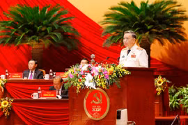 Đại tướng Tô Lâm, Ủy viên Bộ Chính trị, Bí thư Đảng ủy Công an Trung ương, Bộ trưởng Bộ Công an trình bày tham luận. (Ảnh: TTXVN)