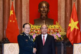 Chủ tịch nước Nguyễn Xuân Phúc tiếp Bộ Quốc phòng Trung Quốc Nguỵ Phượng Hòa. (Ảnh: Thống Nhất/TTXVN)