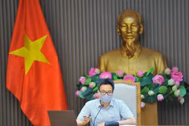 Phó Thủ tướng Chính phủ Vũ Đức Đam, Trưởng Ban Chỉ đạo Quốc gia phòng, chống dịch COVID-19 chủ trì cuộc họp. (Ảnh: Minh Đức/TTXVN)