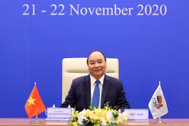 Thủ tướng Nguyễn Xuân Phúc phát biểu tại Hội nghị thượng đỉnh G20 trực tuyến. (Ảnh: Thống Nhất/TTXVN)