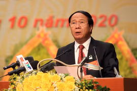 Ông Lê Văn Thành, Ủy viên Trung ương Đảng, Bí thư Thành ủy, Chủ tịch Hội đồng nhân dân thành phố đọc Báo cáo Chính trị tại Đại hội. (Ảnh: An Đăng/TTXVN)
