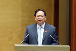 Thủ tướng Phạm Minh Chính phát biểu làm rõ các vấn đề liên quan trước Quốc hội. (Ảnh: Phạm Kiên/TTXVN)