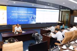 Bộ trưởng, Chủ nhiệm Văn phòng chính phủ, Tổ trưởng Tổ công tác của Thủ tướng Chính phủ Mai Tiến Dũng chủ trì buổi làm việc. (Ảnh: Dương Giang/TTXVN)