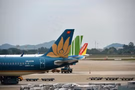 Các hãng hàng không Việt Nam đang đối mặt với những thách thức mang tính sống còn trong hoạt động sản xuất kinh doanh của mình. (Ảnh: Hoàng Anh/Vietnam+)