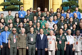Chủ tịch nước Nguyễn Xuân Phúc với các đại biểu. (Ảnh: Thống Nhất/TTXVN) 