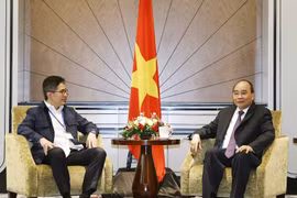 Chủ tịch nước Nguyễn Xuân Phúc tiếp Chủ tịch Phòng Thương mại và Công nghiệp Indonesia Arsjad Rasjid. (Ảnh: Thống Nhất/TTXVN) 