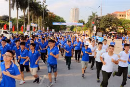 Cán bộ, chiến sỹ và người dân hưởng ứng Ngày chạy Olympic vì sức khỏe toàn dân tỉnh Hà Nam năm 2019. (Ảnh: Đại Nghĩa/TTXVN)