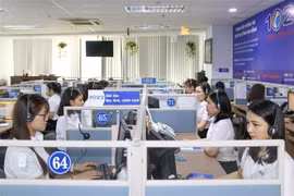 Tổng đài 1022 Đà Nẵng tiếp nhận và xử lý thông tin của người dân, doanh nghiệp. (Ảnh: TTXVN)