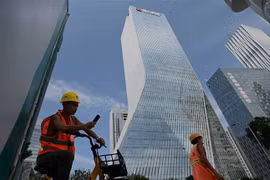 Cuộc khủng hoảng của tập đoàn China Evergrande Group đang là điển hình cho các vấn đề của thị trường bất động sản Trung Quốc. (Ảnh: AFP/TTXVN)